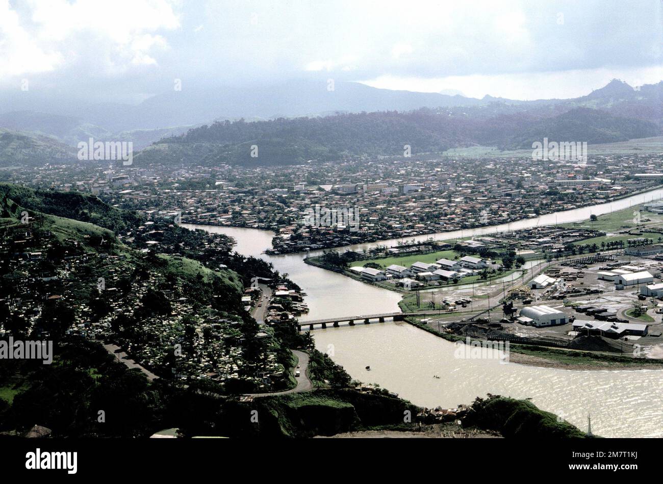 An aerial view of the city of Olongapo. The bridge that leads to the Naval Base, Subic Bay, is visible at bottom right. Base: Luzon Country: Republic Of The Philippines (PHL) Stock Photo
