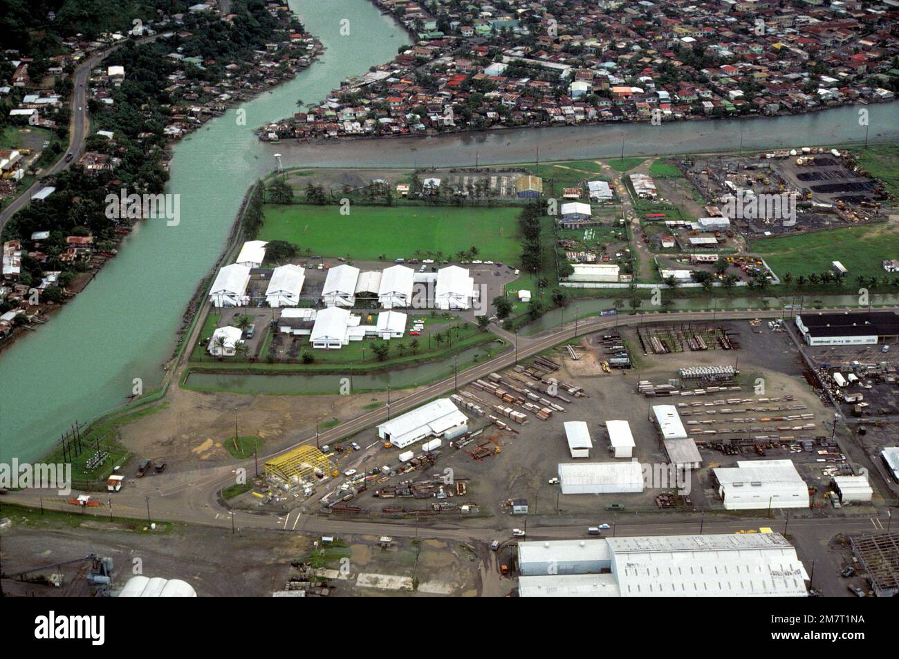 An aerial view of the Naval Base, Subic Bay, right, and, on the other side of the canal, the city of Olongapo. Base: Luzon Country: Republic Of The Philippines (PHL) Stock Photo