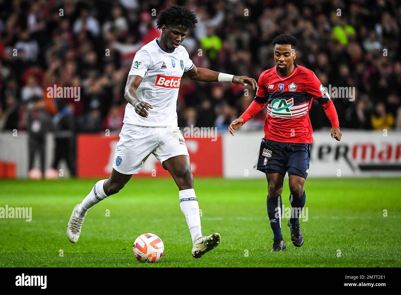 Jackson PAROZO of ESTAC Troyes and Angel GOMES of Lille during the French  Cup, round of 64 football match between LOSC Lille and ESTAC Troyes on  January 8, 2023 at Pierre Mauroy