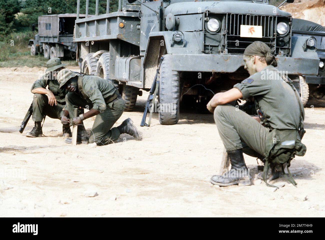 Aggressors of the 554th Civil Engineering Squadron set up trip flares
