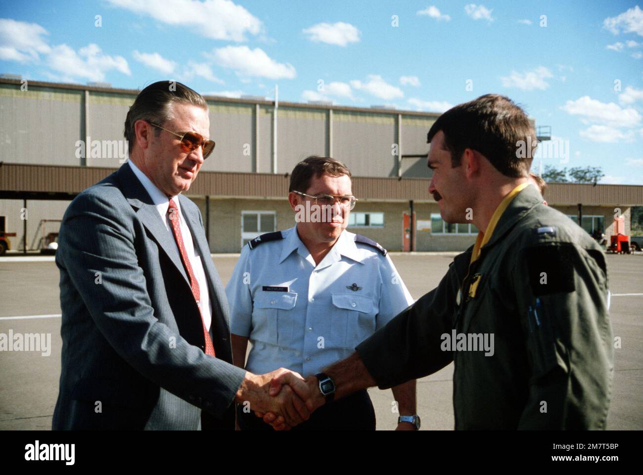 COL W.R. Macfarlane, center, and 1LT Jeff Hamilton, right, prepare to ...
