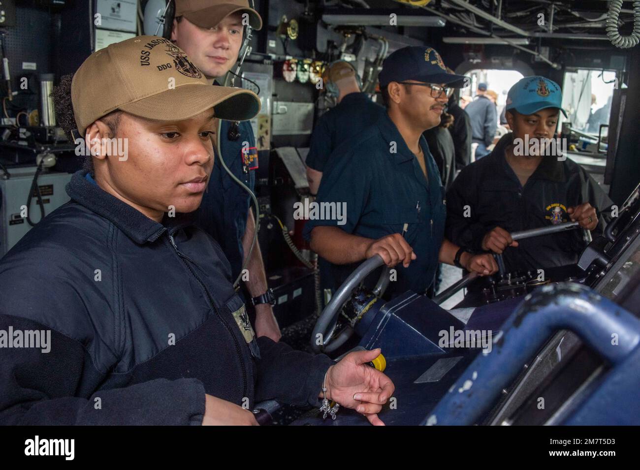 220512-N-UP745-1006 IONIAN SEA (May 12, 2022) Sailors, aboard Arleigh-Burke class guided-missile destroyer USS Jason Dunham (DDG 109), man the helm and lee helm while setting the commander’s restricted maneuvering doctrine, in the Ionian Sea, May 12, 2022. Jason Dunham is a part of the Harry S. Truman Carrier Strike Group on a scheduled deployment in the U.S. 6th Fleet area of operations in support of U.S., allied and partner interest in Europe and Africa. Stock Photo