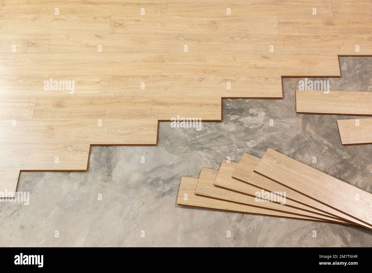 Variety of wooden like tiles. Samples of fake wood tiles for flooring.  Assortment of floor laminate / tiles in an interior shop Stock Photo - Alamy