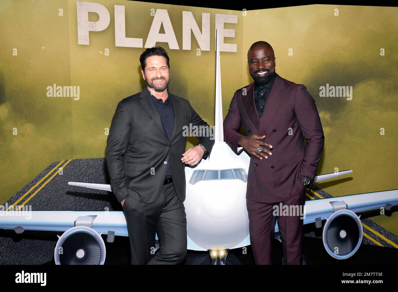 Gerard Butler, left, and Mike Colter attend a "Plane" screening at AMC