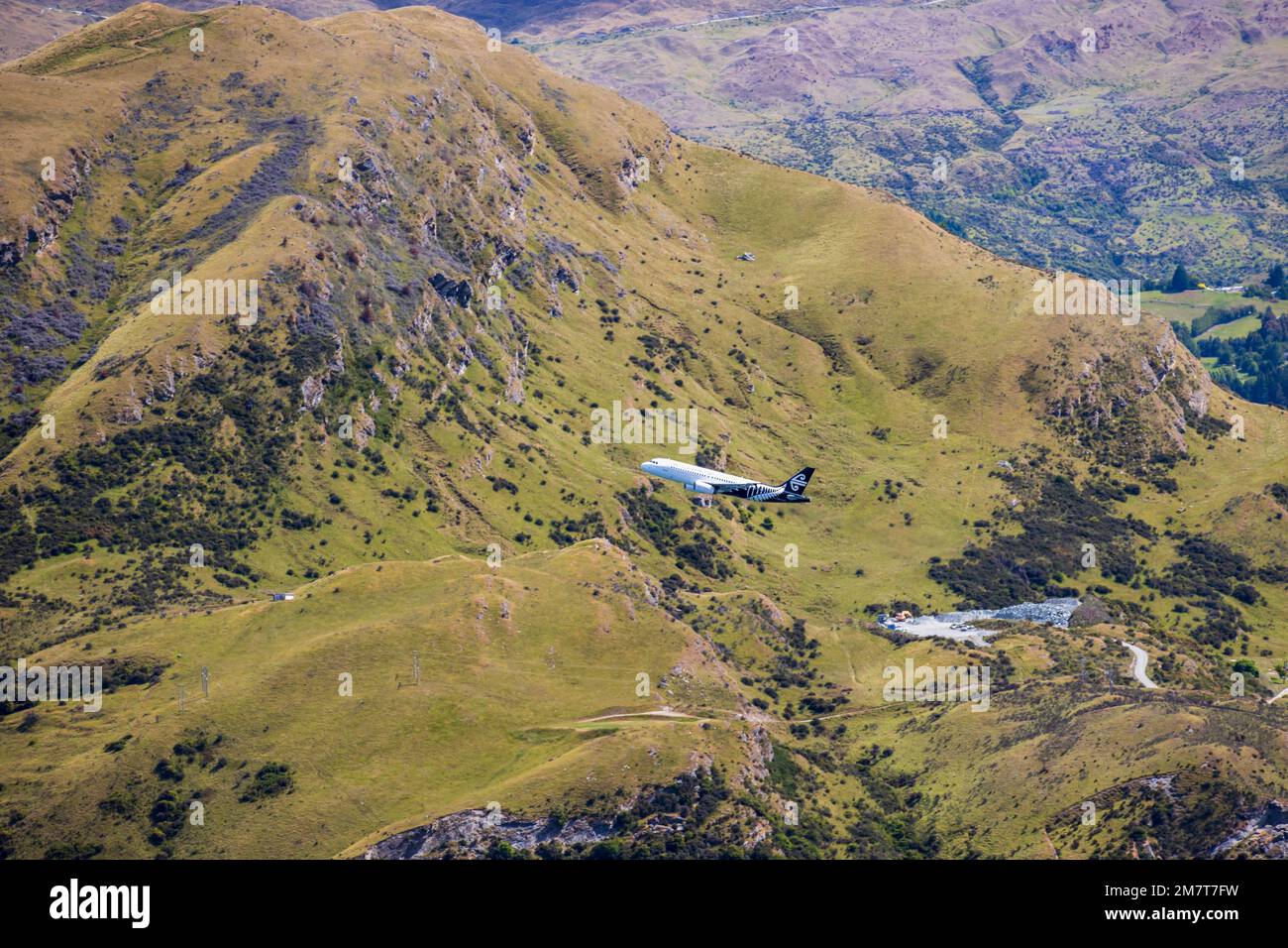 Air NZ aeroplane taking off from Queenstown Airport, New Zealand, Monday, December 26, 2022. Stock Photo