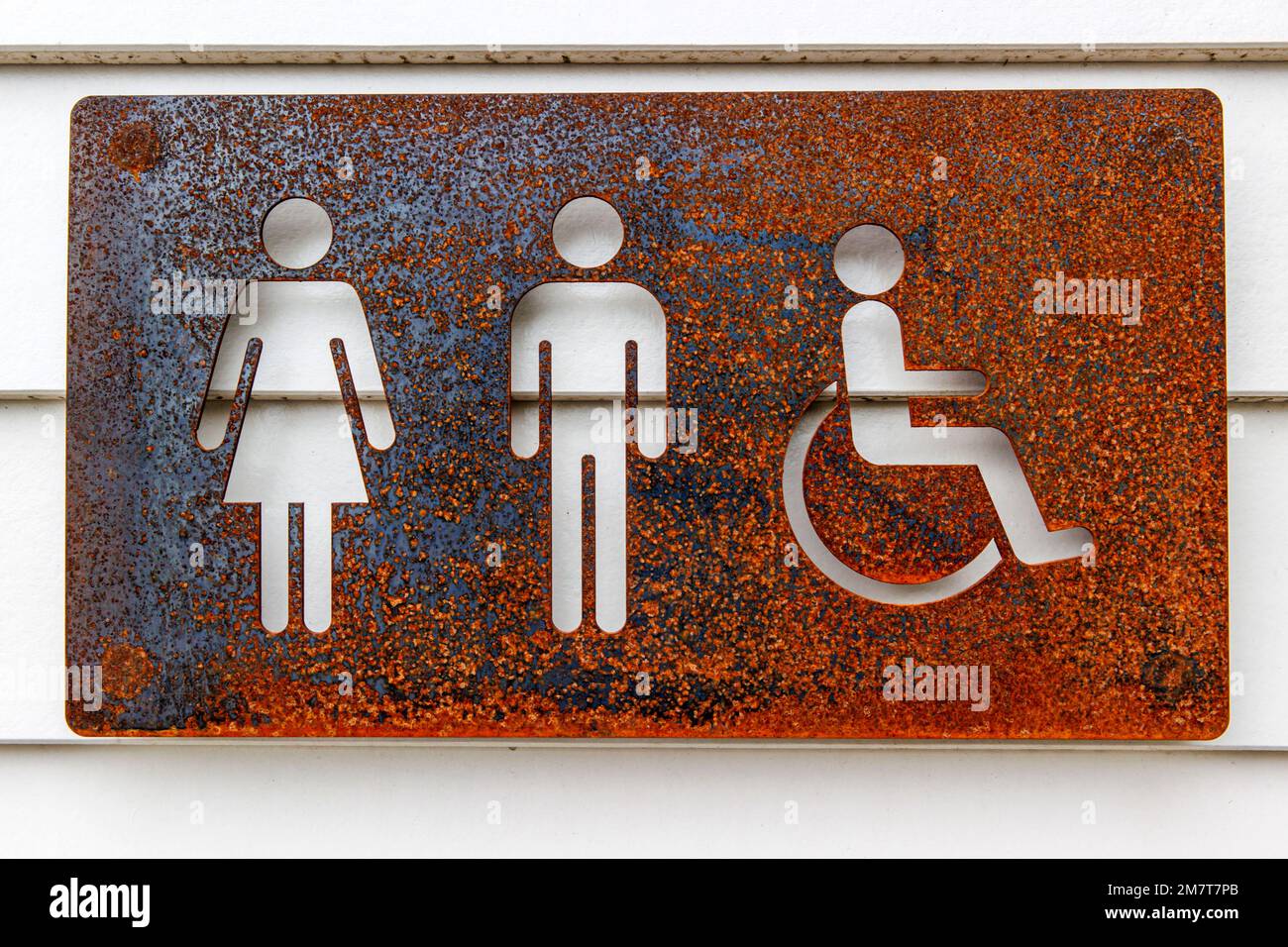 Rustic iron public toilet sign, Arrowtown, New Zealand, Tuesday, December 27, 2022. Stock Photo