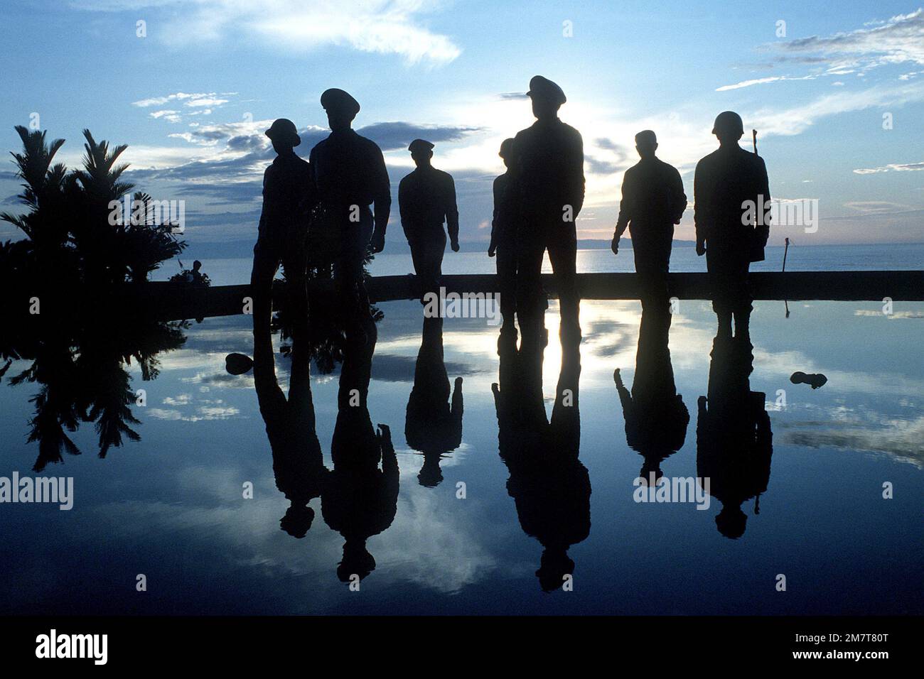 Silhouetted view of the life-like monument commemorating GEN Douglas MacArthur's return here on Oct 20, 1944. MacArthur's return fulfilled his earlier and oft-quoted promise of 'I shall return'. Base: Leyte Island Country: Philippines (PHL) Stock Photo