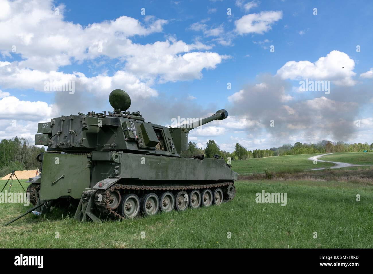 Ukrainian artillerymen fire the M109 self-propelled howitzer during training at Grafenwoehr Training Area, May 12, 2022. Soldiers from the U.S. and Norway trained Armed Forces of Ukraine artillerymen on the howitzers as part of security assistance packages from their respective countries. Stock Photo