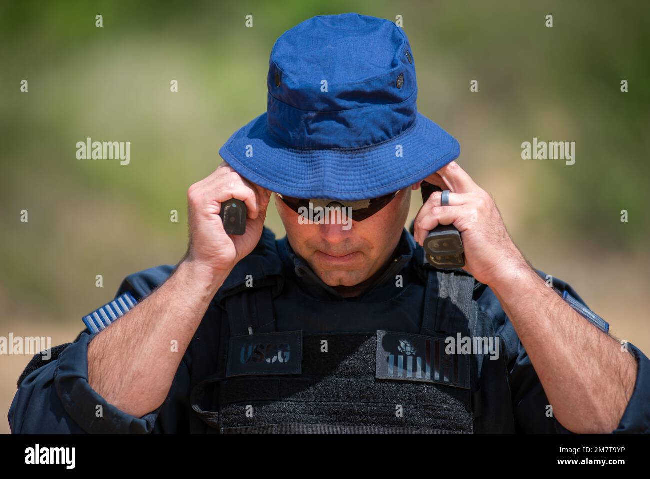 A Coast Guard Maritime Safety and Security New Orleans team member ...