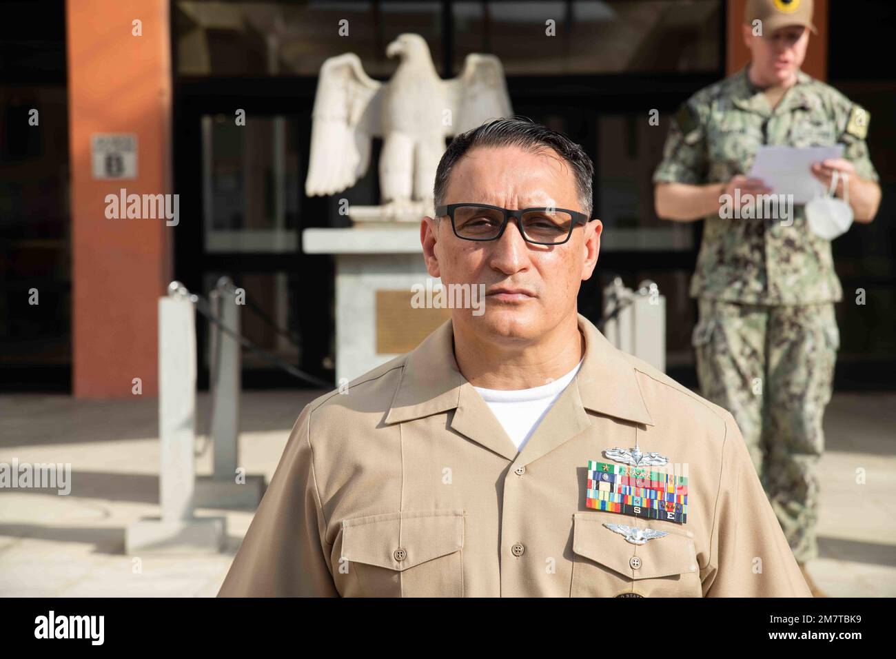 NAPLES, ITALY –– Master Chief Navy Counselor Eric Torra, from Miami, is frocked during his promotion ceremony, May 13, 2022 in Naples, Italy. Navy Region EURAFCENT oversees nine installations in seven countries, enabling U.S., allied and partner nation forces to be where they are needed, when they are needed, in order to ensure security and stability in the European, African, and Central Command areas of responsibility. Stock Photo