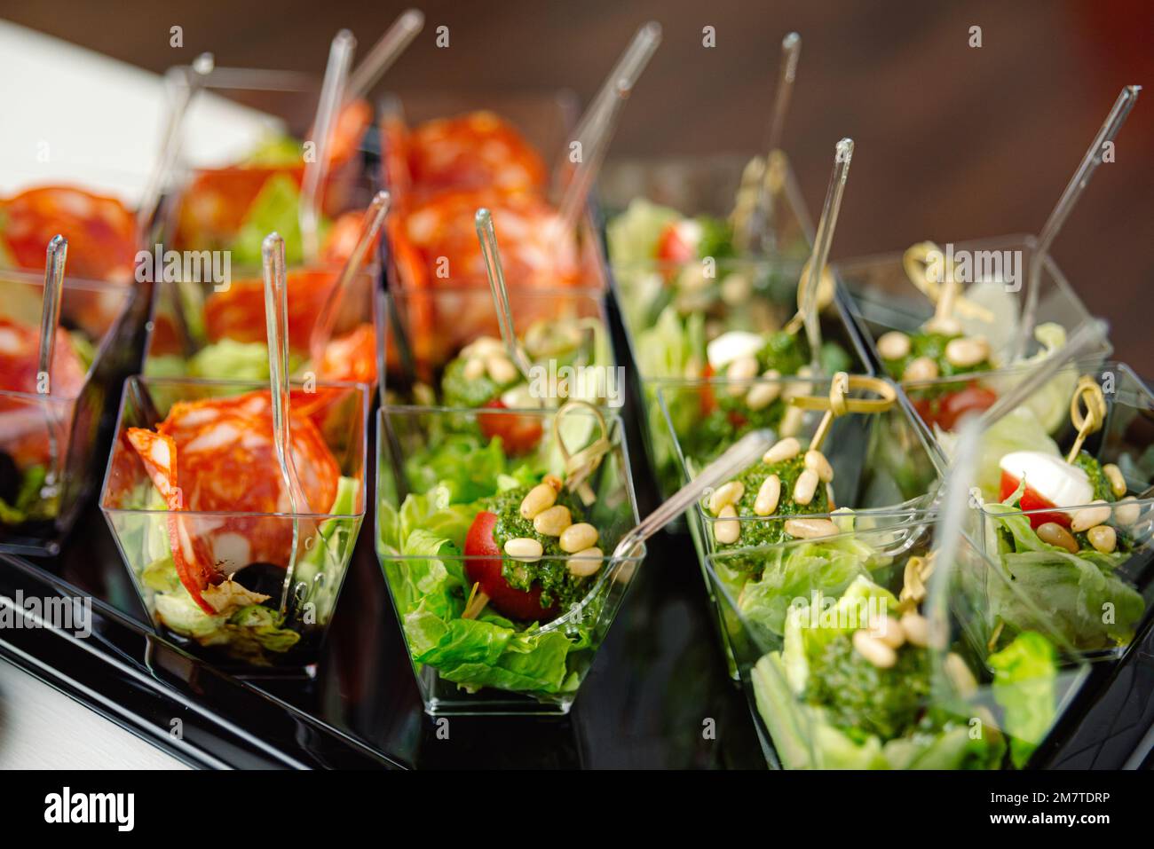 catering delivery tray servings of salads in plastic containers