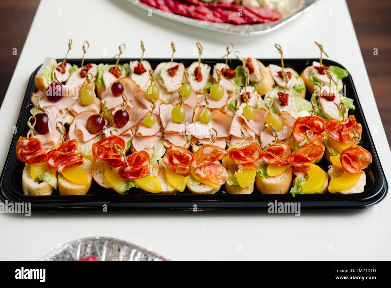 catering delivery tray appetizers canapés on a skewer Stock Photo Alamy