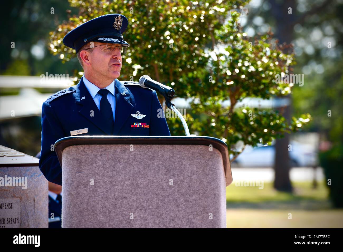 U.S. Air Force Lt. Gen. Jim Slife, commander of Air Force Special Operations Command, addresses attendees at the Silver Star Medal ceremony for Master Sgt. Cory Haggett, a special tactics operator with the 23d Special Tactics Squadron, 24th Special Operations Wing, May 13, 2022, at Hurlburt Field, Fla.  During the ceremony, Haggett received the nation’s third-highest military combat medal for his gallant actions while deployed in 2017 to Southwest Asia. Stock Photo