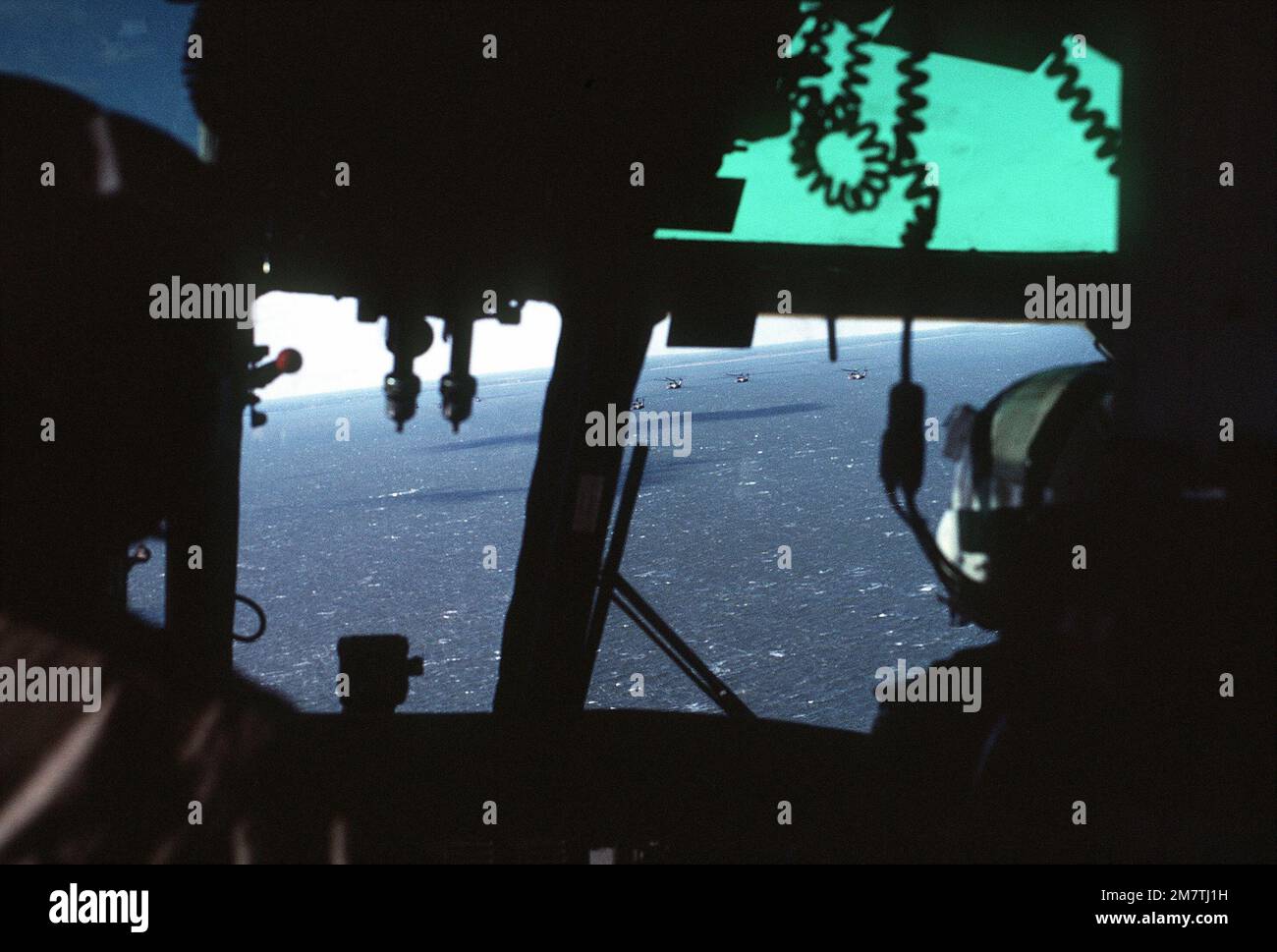 In-flight RH-53D Sea Stallion helicopters as seen from the cockpit of an SH-3 Sea King helicopter during search and rescue (SAR) operations. Country: Chesapeake Bay Stock Photo