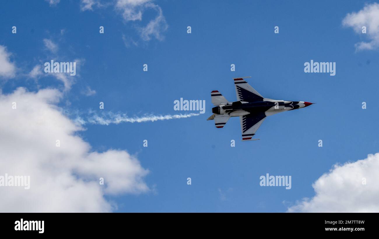 A U.S. Air Force Thunderbird preforms a solo act in preparation for