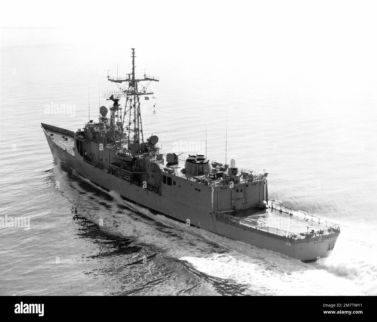Aerial port quarter view of the guided missile frigate USS BOONE (FFG