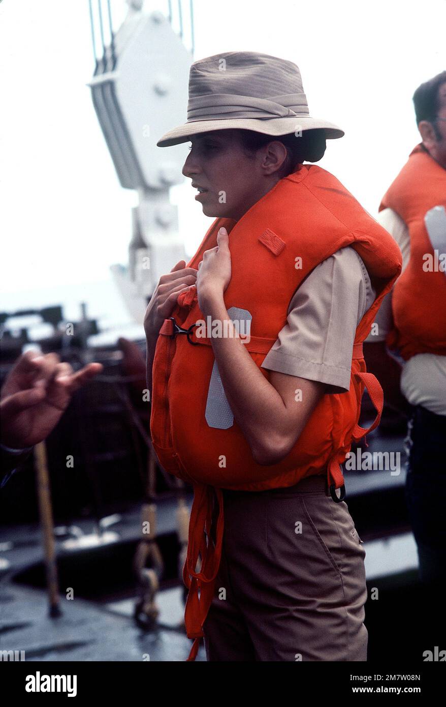 A female crew member aboard the surveying ship USNS CHAUVENET (T-AGS-29). The CHAUVENET is on a surveying assignment to update present navigation charts of the strait. Base: Makassar Strait Country: Indonesia (IDN) Stock Photo