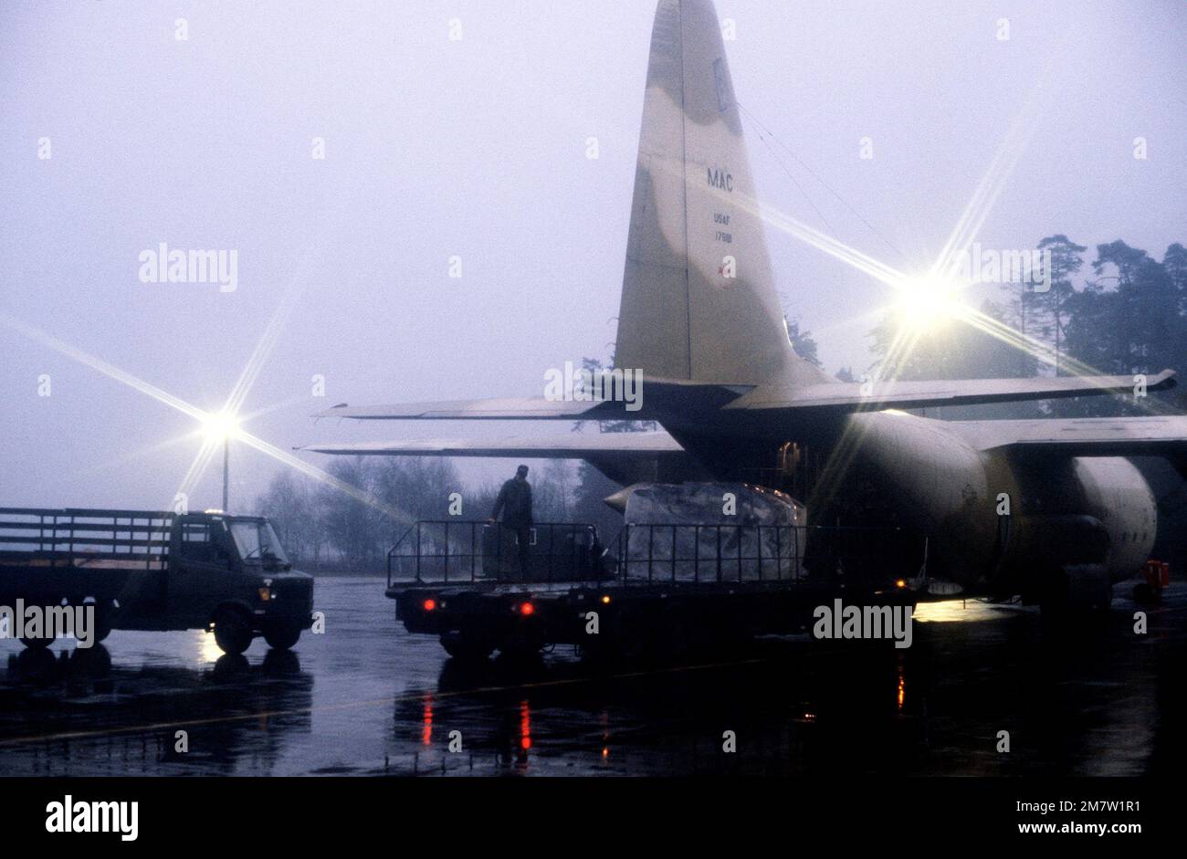 A right rear view of a C-130 Hercules aircraft from the 37th Tactical ...