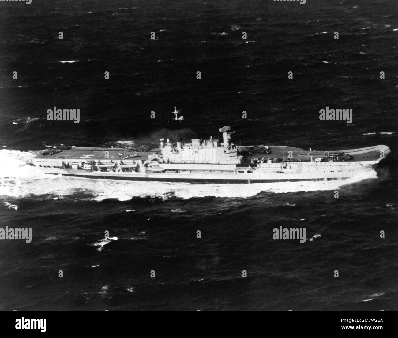 Aerial starboard beam view of the British aircraft carrier HMS HERMES ...