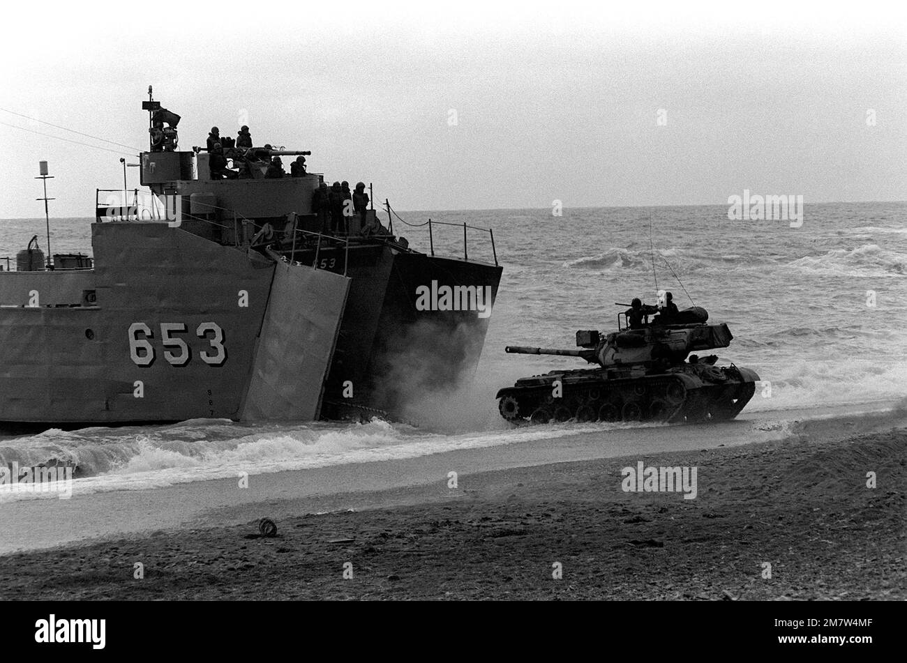 A South Korea tank exits the back of a medium landing ship (LSM-653) (ex-USS LSM-54) during exercise Team Spirit '82. Subject Operation/Series: TEAM SPIRIT '82 Base: Pohang Country: Republic Of Korea (KOR) Stock Photo