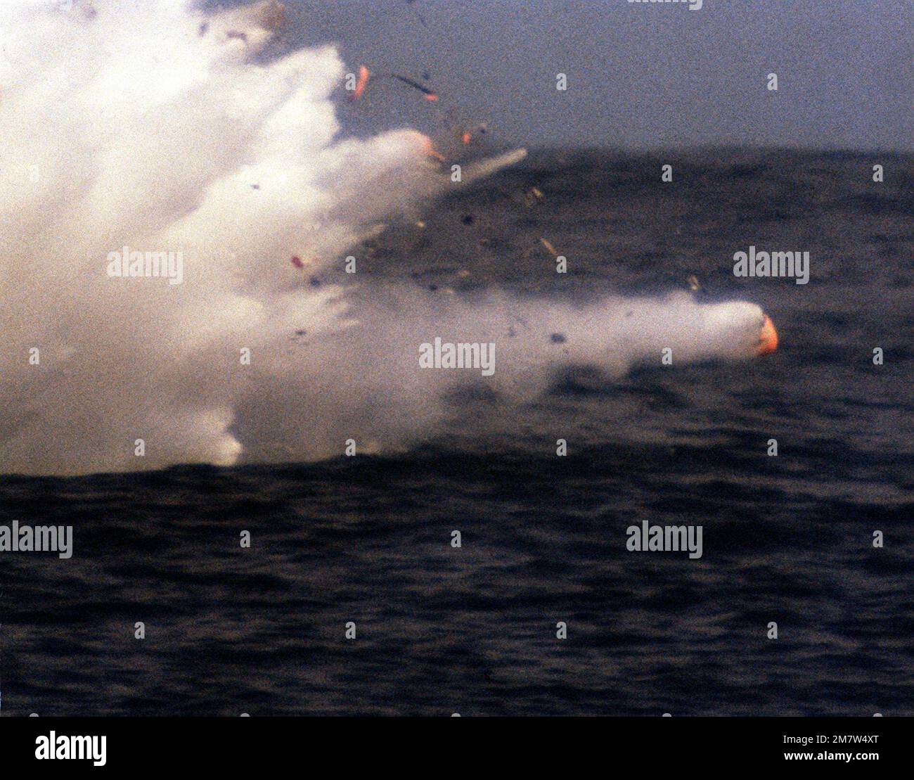 Exploding Tomahawk A view of a BGM-109 Tomahawk missile hitting its target during a land ...