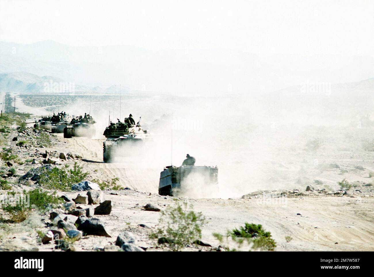 Members of the 4th Battalion, 37th Armor Division, move toward the ...