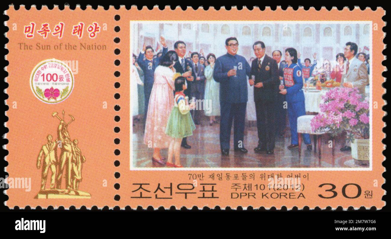 2012 North Korea stamp set. 100th Anniversary of the Birth of Kim II Sung. 'Great parent of 700,000 Koreans in Japan' Stock Photo