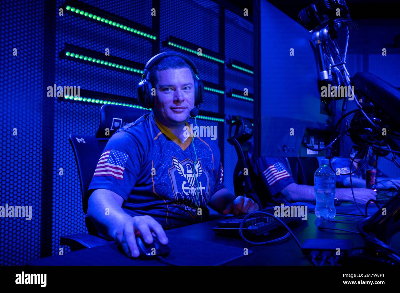 220514-N-WF272-1007 PHILADELPHIA (May 14, 2022) U.S. Navy Chief Electronics Technicians (Navigation) Michael Cox, a native of Annapolis, Md., assigned to the Navy’s esports team, Goats & Glory, prepares to play Valorant during the Valorant $5K Lan Tournament, part of a Navy Promotional Day (NPD) Philadelphia, May 14, 2022. Goats & Glory is dedicated to outreach and engagement with members of the gaming community, showcasing life and opportunities available in the Navy. The purpose of an NPD is to build and sustain strategic networks with high schools, universities and colleges, and to promote Stock Photo