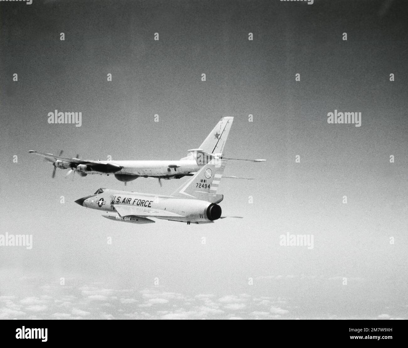 A left rear view of an F106A Delta Dart aircraft intercepting a Soviet