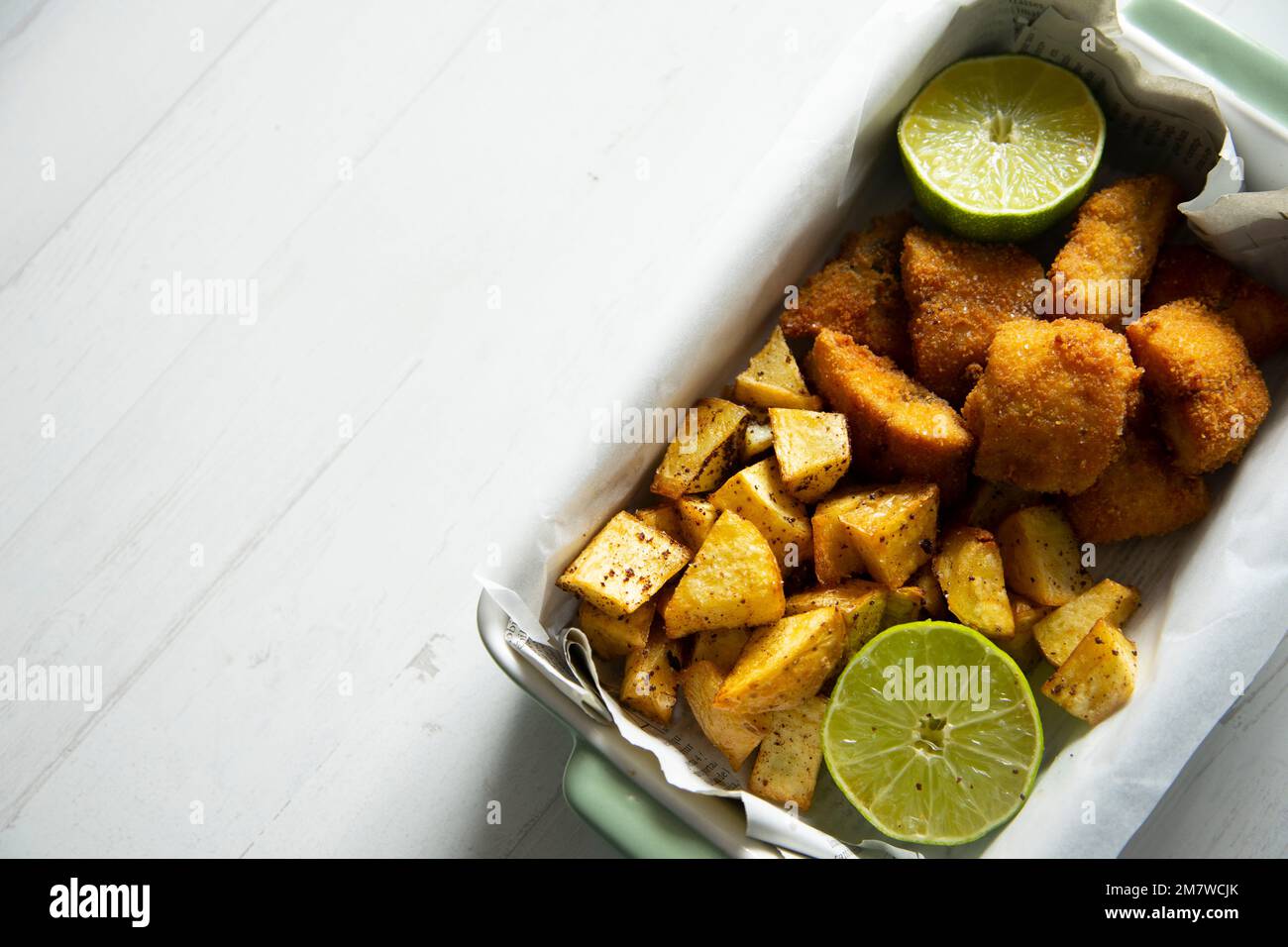 Battered mackerel fish and chips with potatoes Stock Photo Alamy