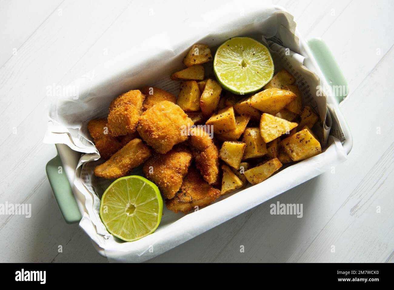 Battered mackerel fish and chips with potatoes Stock Photo Alamy
