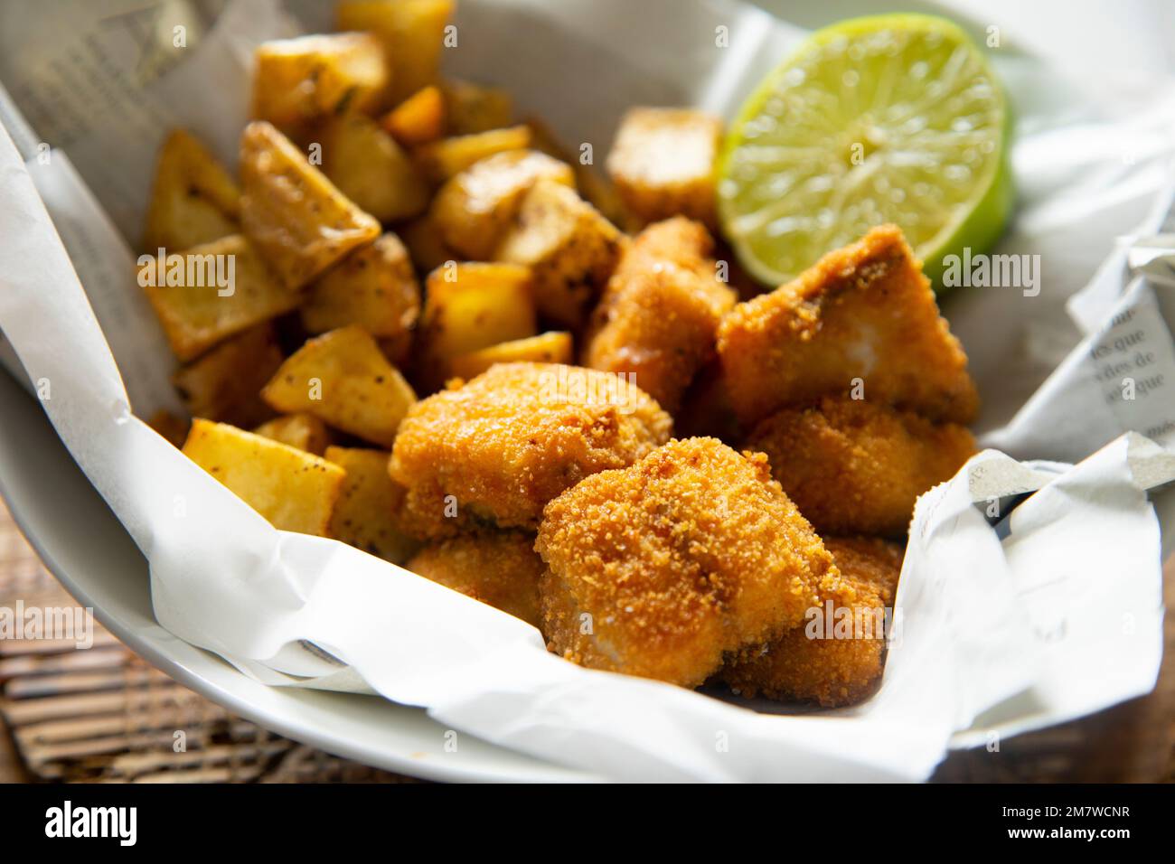 Battered mackerel fish and chips with potatoes Stock Photo Alamy