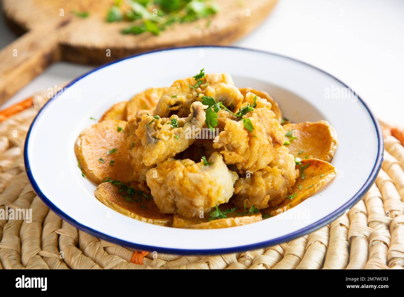 Battered mackerel fish and chips with potatoes Stock Photo Alamy