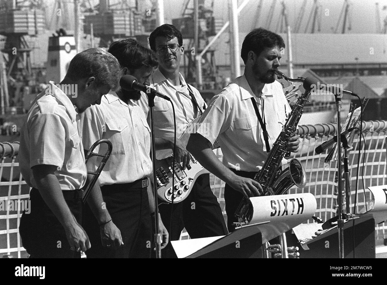 A U.S. Navy band entertains visitors aboard the destroyer USS JOHN RODGERS (DD-983) during a port visit. Base: Casablanca Country: Morocco (MAR) Stock Photo