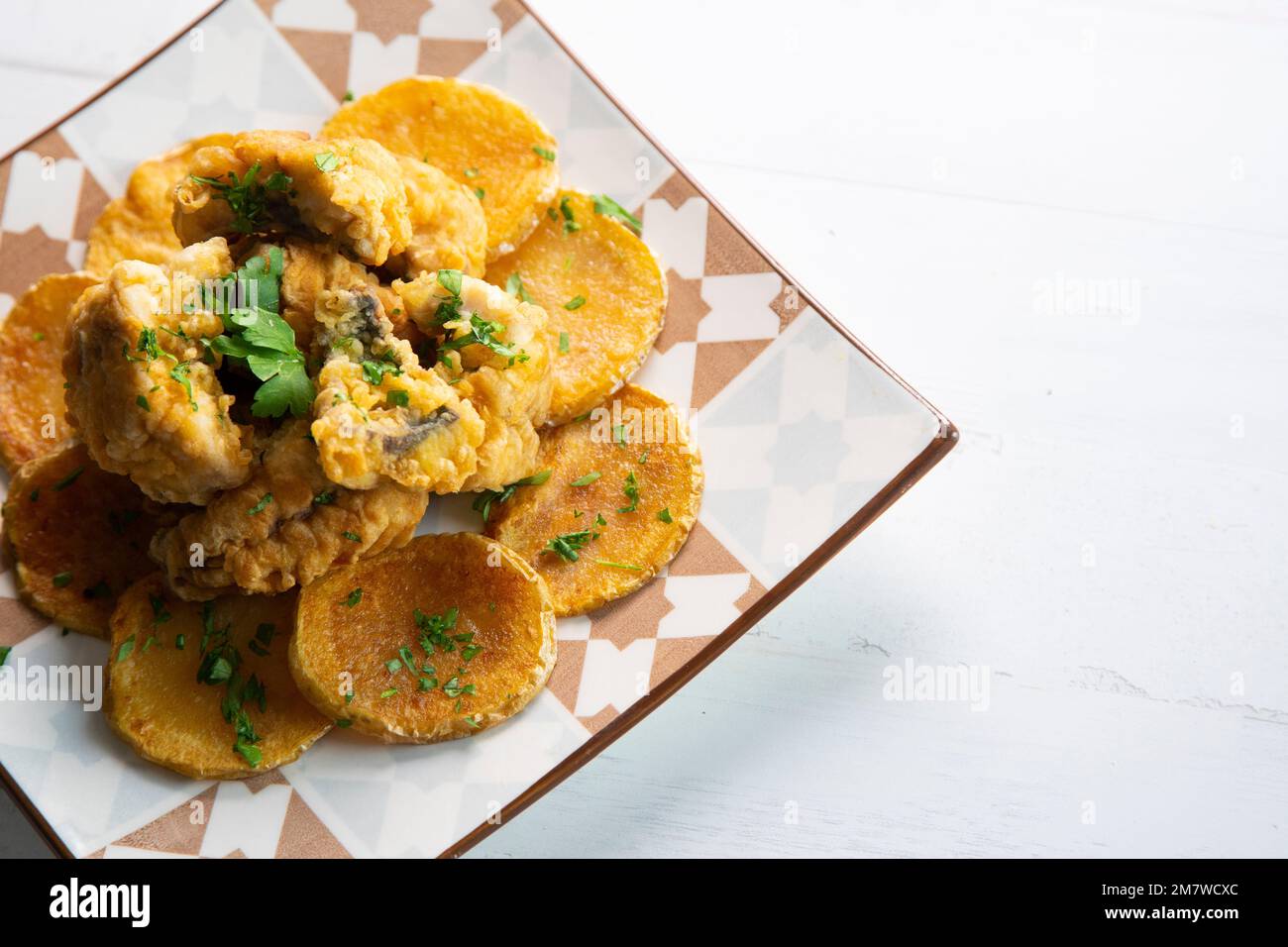 Battered mackerel fish and chips with potatoes Stock Photo Alamy