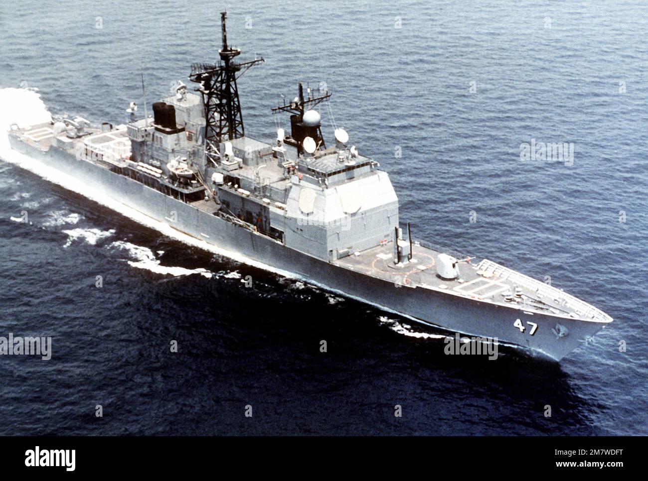 An aerial starboard bow view of the Aegis guided missile cruiser ...