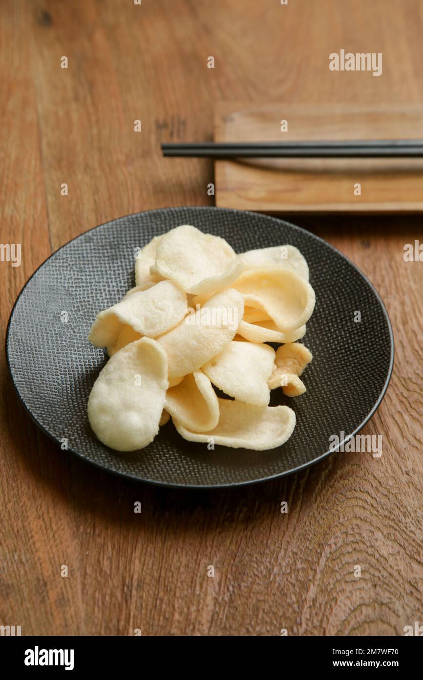 Prawn crackers - a deep fried snack made from starch and prawn, common snack in Southeast Asian cuisine Stock Photo