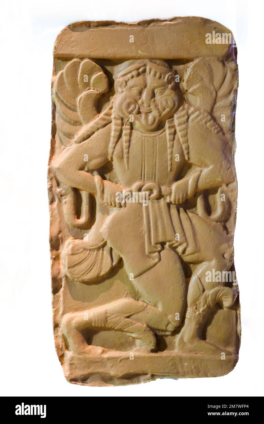 Relief tablet (pinakes) with figure of running Gorgon - Archaeological Museum 'Pietro Griffo' of Agrigento - Sicily, Italy Stock Photo