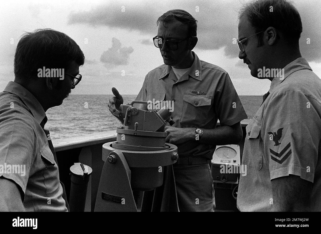 SENIOR CHIEF Iverson explains the use and operation of the alidade