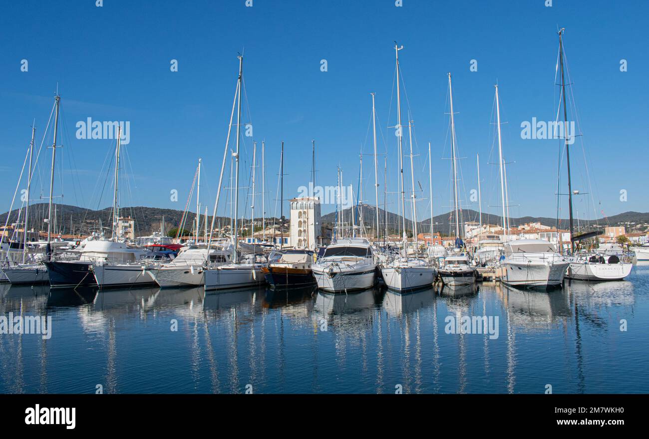 Port grimaud hotels boats and river day time Stock Photo Alamy