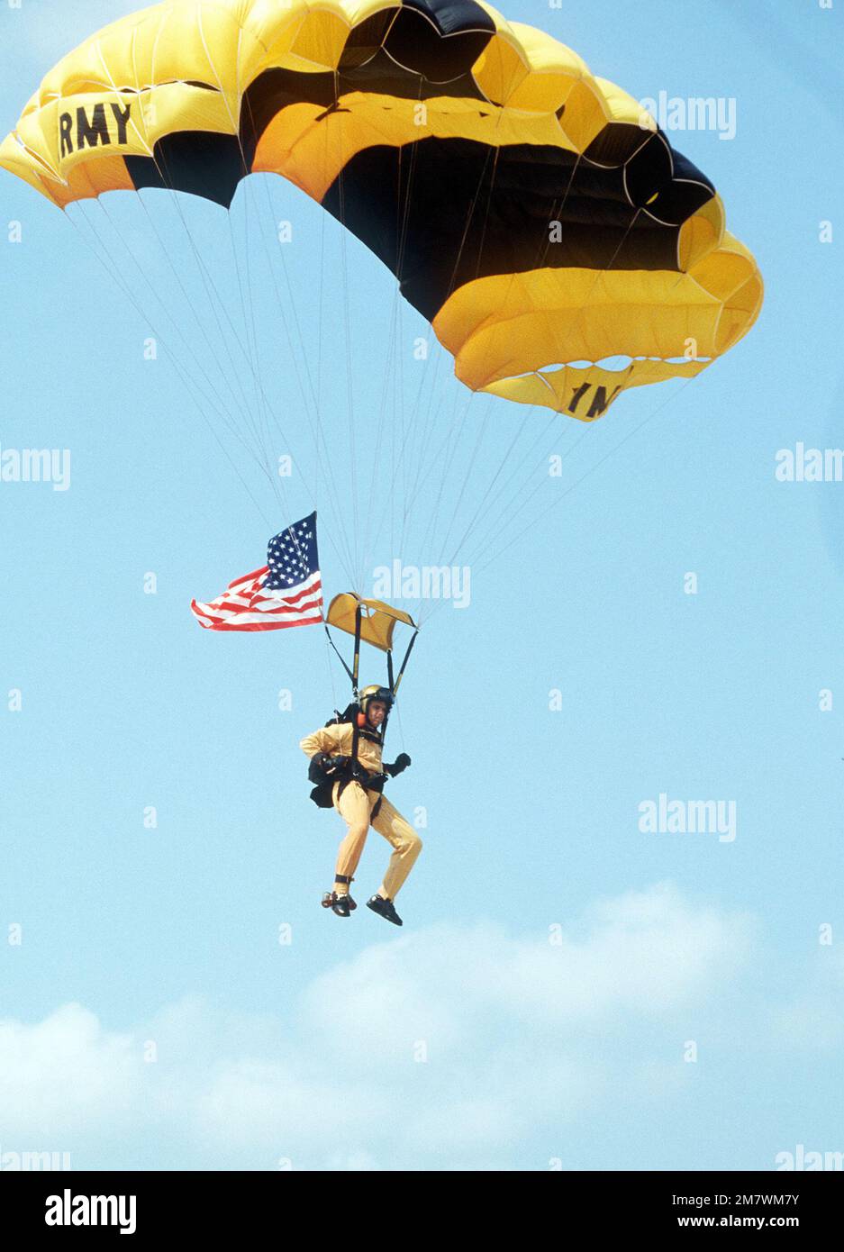 A member of the U. S. Army parachuting team, the Golden Knights ...
