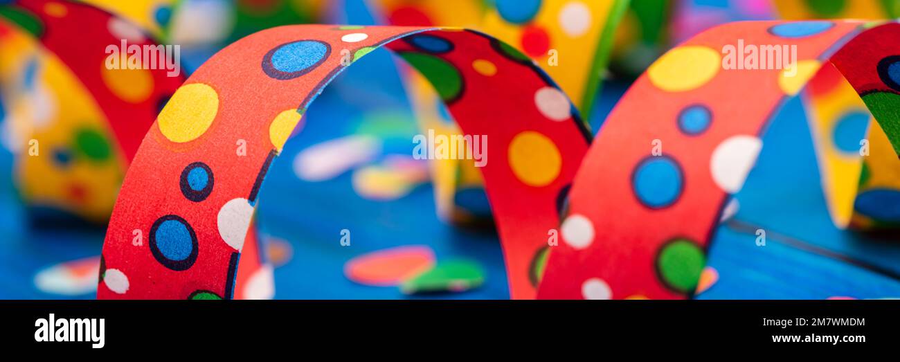 Colourful confetti streamer at party Stock Photo