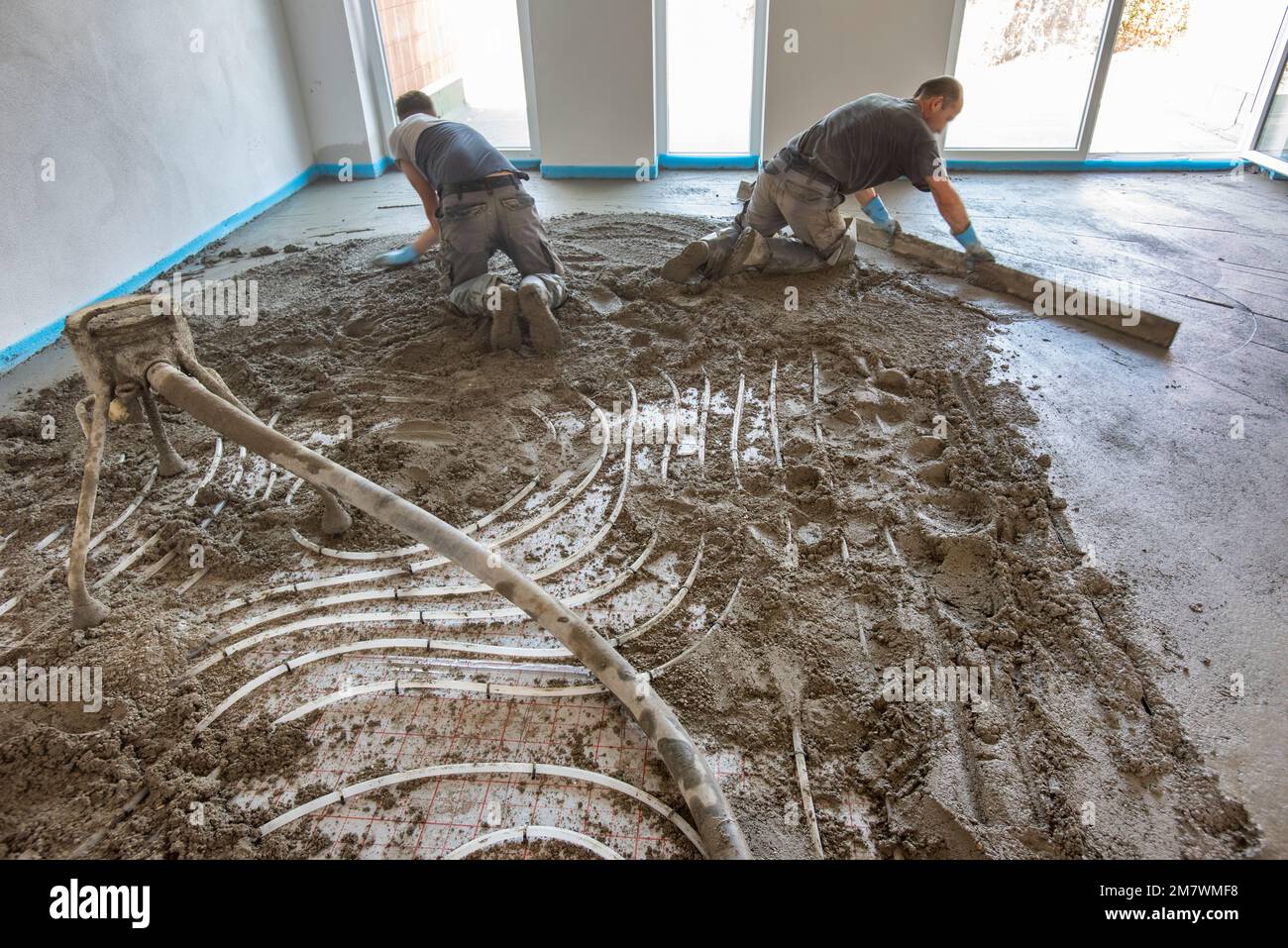 Screeding at construction of new built house Stock Photo