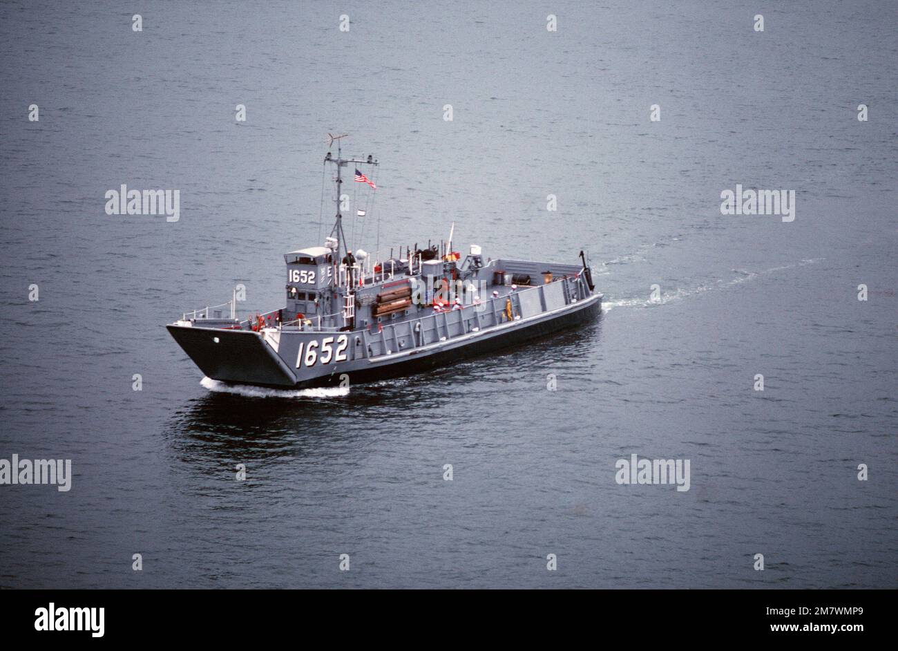 An aerial port bow view of the utility landing craft (LCU-1652) attached to Assault Craft Unit One (ACU-1) during a practice landing at the Silver Strand area of North Island. Base: San Diego State: California (CA) Country: United States Of America (USA) Stock Photo
