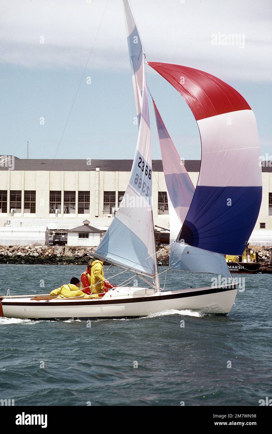 A sail boat under full sail takes part in the Treasure Island Yacht