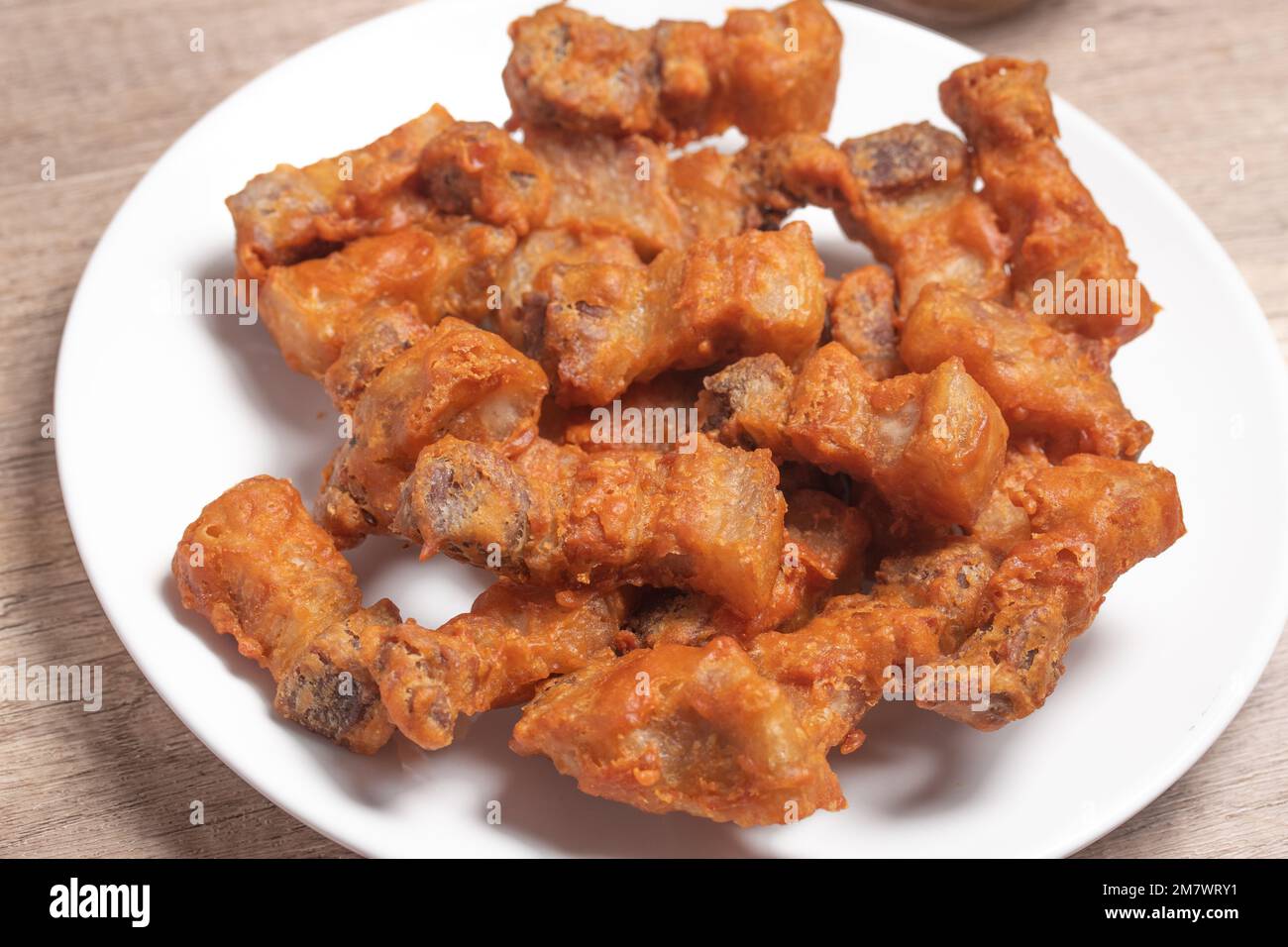 Deep fried pork belly with fish sauce and spicy dipping sauce Stock