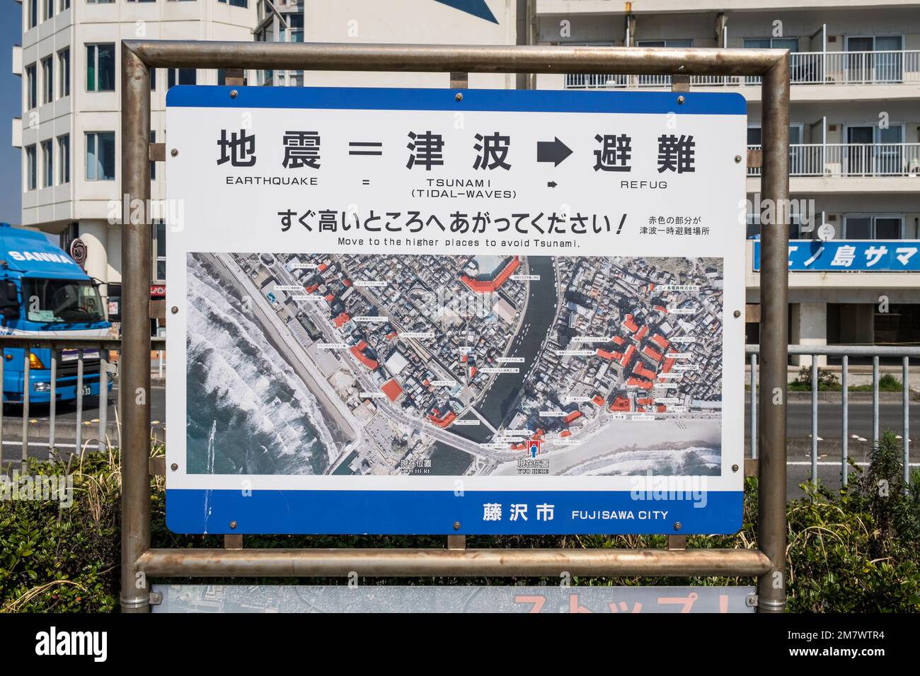 Japan, Kamakura: sign showing the tsunami / tidal wave evacuation routes and safe zones, Honshu Island Stock Photo