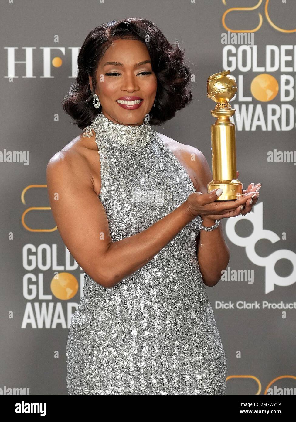 Angela Bassett, poses with the Best Supporting Actress in a Motion ...