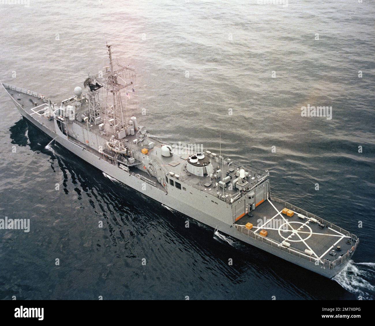 Aerial port quarter view of the Oliver Hazard Perry class guided missile frigate USS AUBREY
