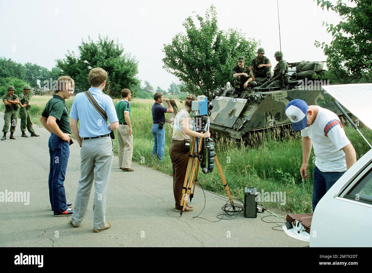The U.S. Army Audio-Visual Center television conducts interviews with soldiers on an armored personnel carrier during Exercise Reforger '82. Subject Operation/Series: REFORGER '82 Base: Fort Riley State: Kansas (KS) Country: United States Of America (USA) Stock Photo